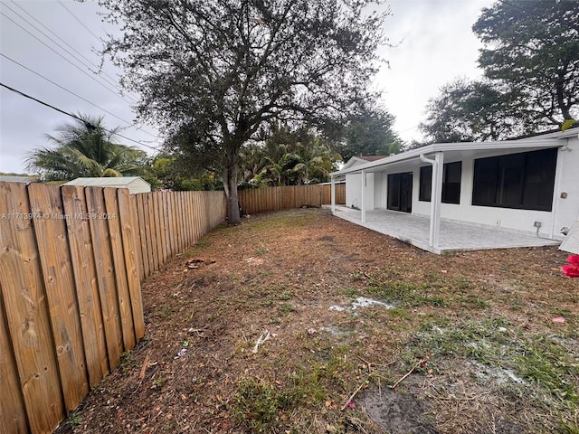 view of yard with a patio area