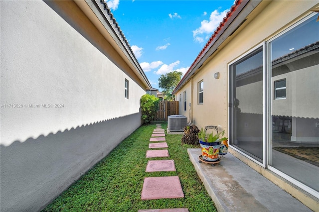 view of yard featuring central AC