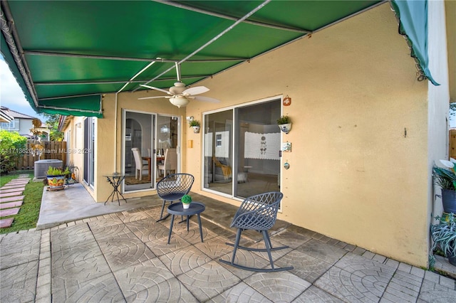 view of patio / terrace featuring ceiling fan