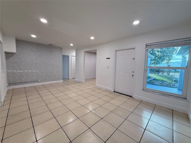 interior space with light tile patterned floors