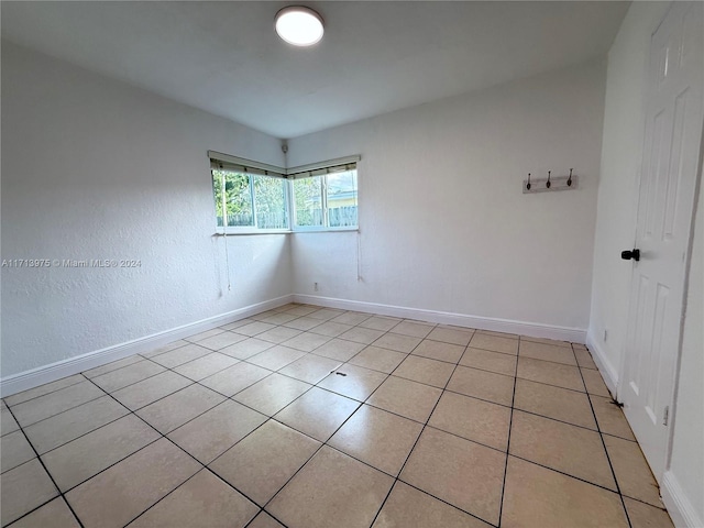 view of tiled spare room