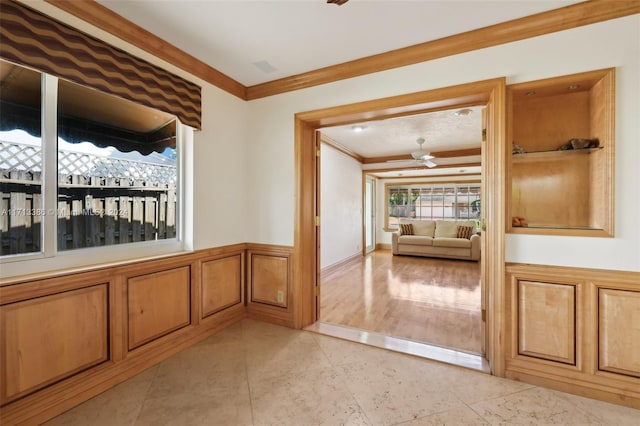 interior space with crown molding