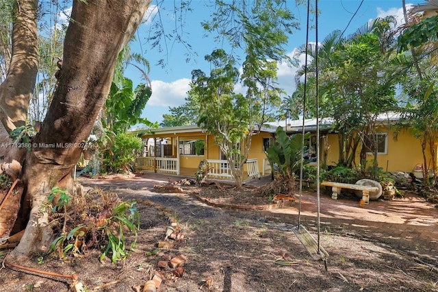 exterior space featuring covered porch