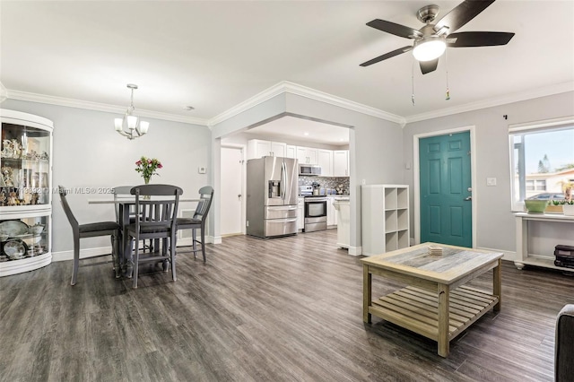 13379 Via Vesta Unit B, Delray Beach, FL 33484 - living room featuring dark wood-type flooring, ceiling fan, a chandelier, and crown molding