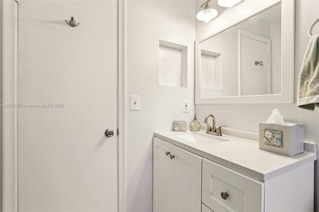 full bathroom with vanity, toilet, and shower / bath combo with shower curtain