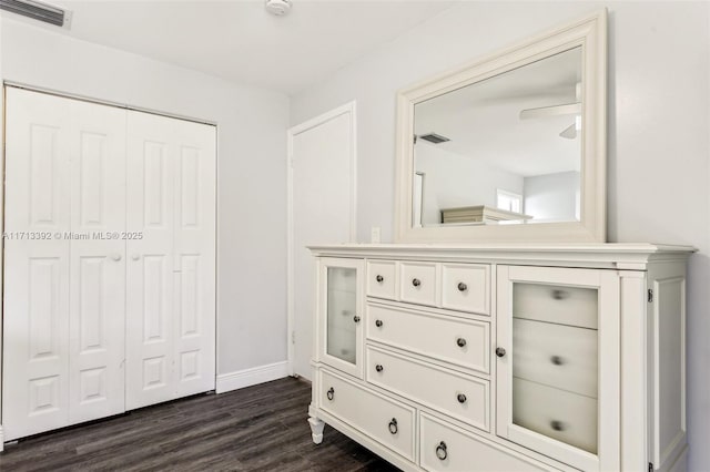 bathroom featuring wood-type flooring and ceiling fan