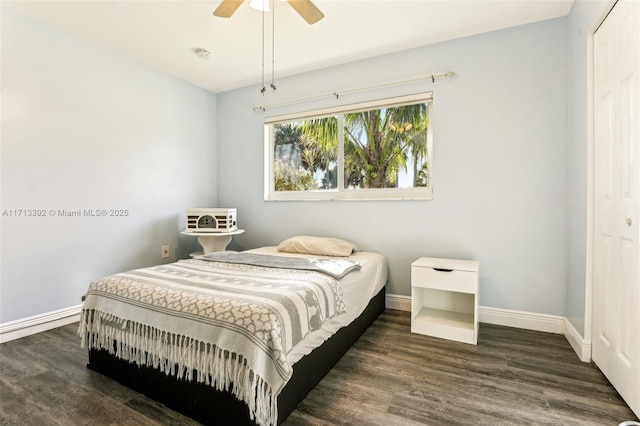 bedroom featuring ceiling fan, dark hardwood / wood-style flooring, access to outside, and ornamental molding