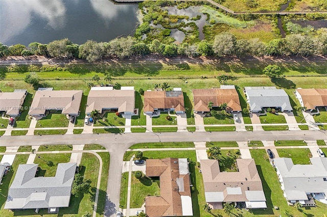 drone / aerial view with a water view