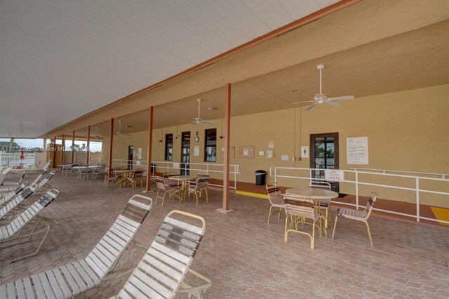 view of patio featuring ceiling fan