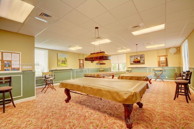 game room featuring a paneled ceiling, a wealth of natural light, light carpet, and billiards