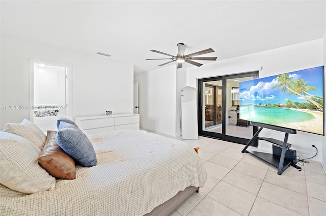 tiled bedroom with access to outside and ceiling fan