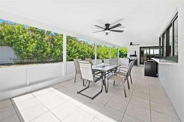 exterior space featuring ceiling fan