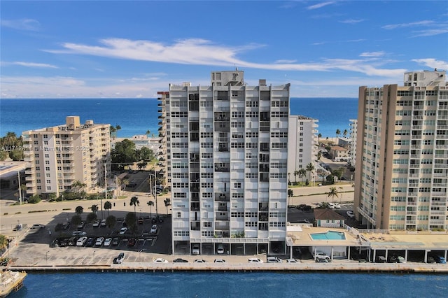 view of building exterior featuring a water view