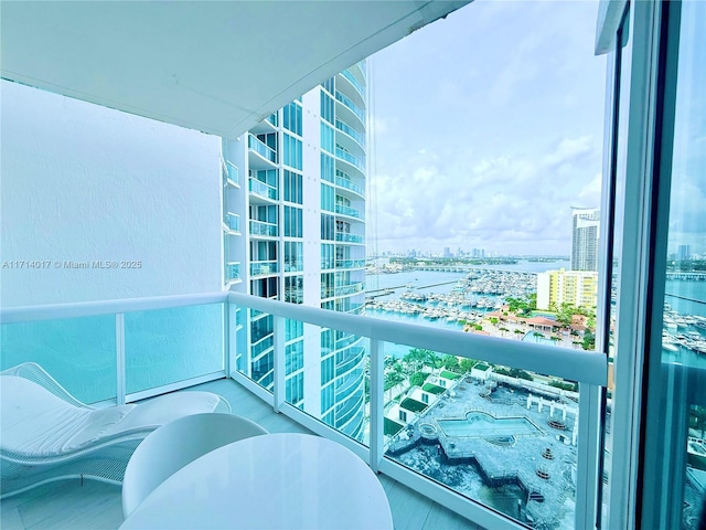 balcony featuring a water view