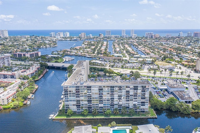 birds eye view of property featuring a water view