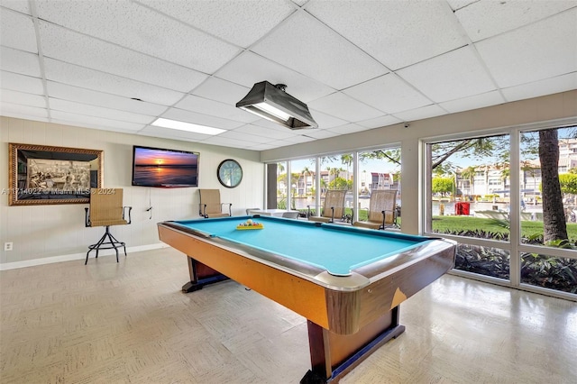 game room with a paneled ceiling and pool table