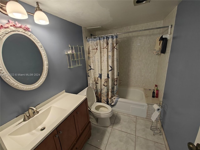 full bathroom with toilet, shower / bath combo, vanity, and tile patterned floors