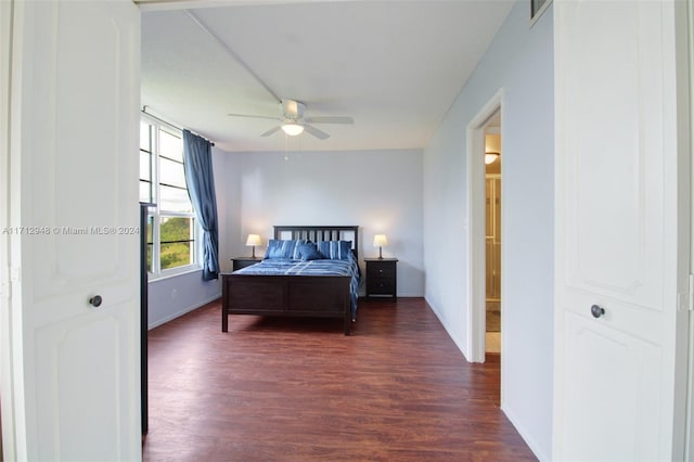 bedroom featuring dark hardwood / wood-style floors and ceiling fan