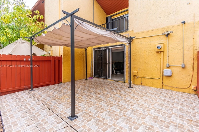 view of patio / terrace with a balcony