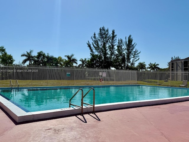 community pool with fence