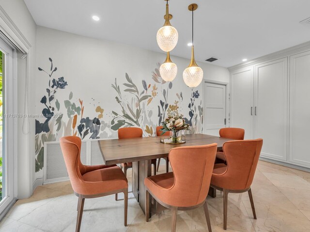 dining room featuring a healthy amount of sunlight