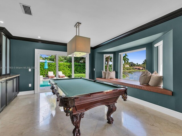 playroom featuring a healthy amount of sunlight, a water view, ornamental molding, and billiards