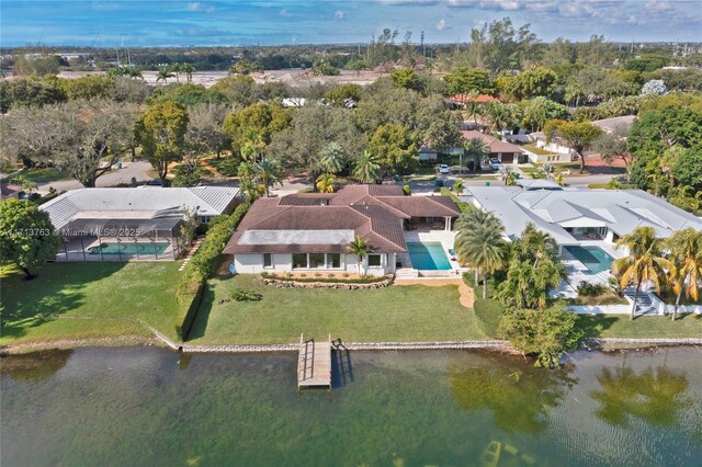 drone / aerial view with a water view