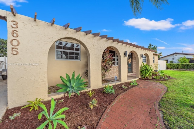 exterior space with a front yard