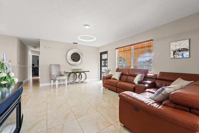 living room featuring light tile patterned floors