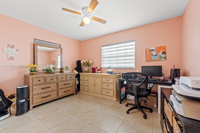 home office with ceiling fan and light tile patterned floors