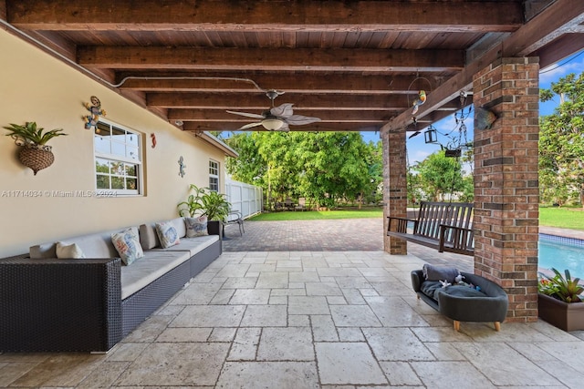 view of patio / terrace with ceiling fan and an outdoor hangout area