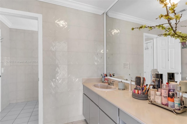 bathroom featuring tile patterned flooring, crown molding, tile walls, and vanity