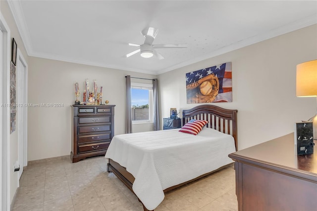 bedroom with ornamental molding, ceiling fan, and light tile patterned floors