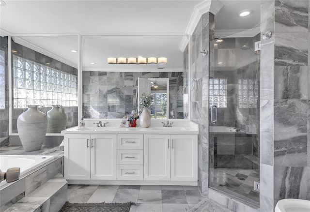 full bath featuring double vanity, a sink, a washtub, and a shower stall