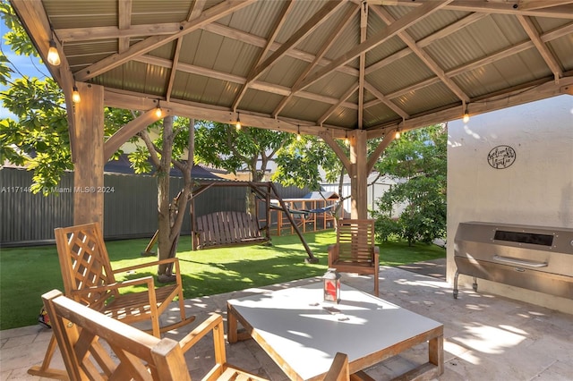 view of patio / terrace featuring a fenced backyard and a gazebo