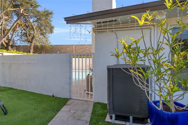 exterior space featuring a gate and fence