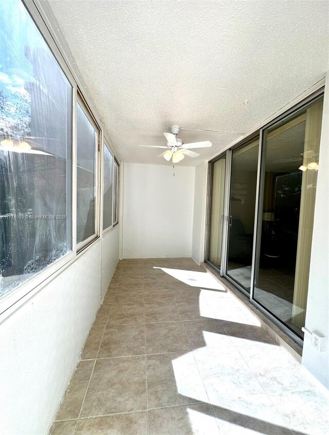 full bathroom with toilet, tile patterned floors, vanity, and shower / tub combo with curtain