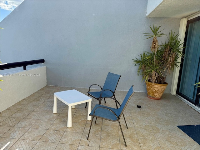 view of patio / terrace featuring a balcony