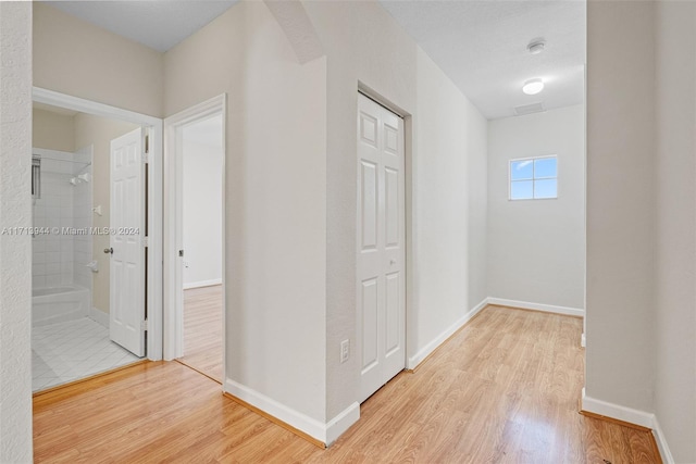 hall featuring light hardwood / wood-style flooring