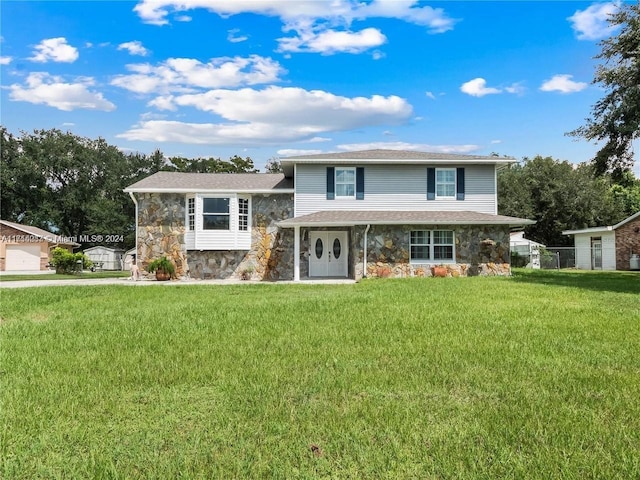 view of front of property featuring a front yard