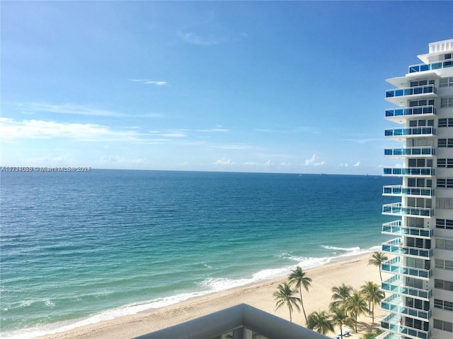 property view of water featuring a beach view