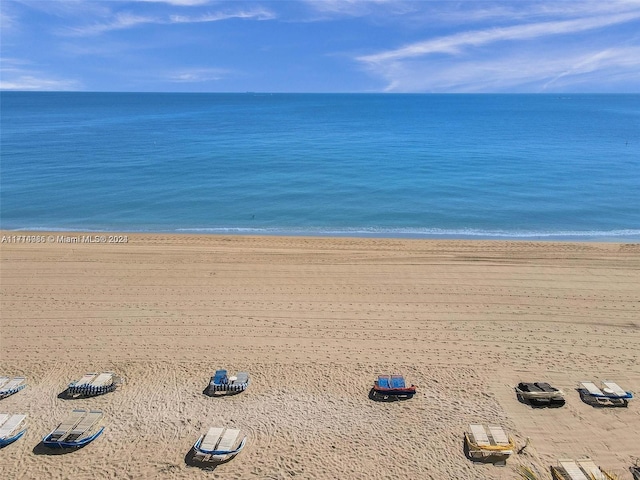 property view of water featuring a beach view