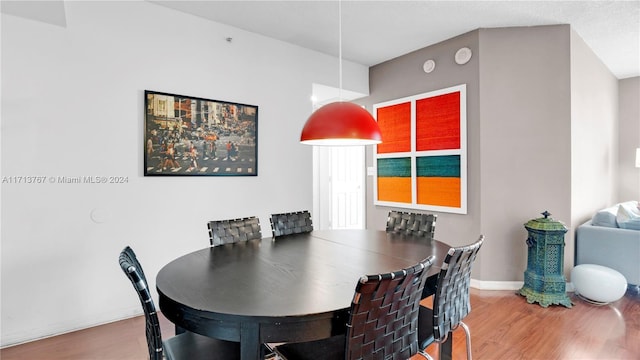 dining room with hardwood / wood-style flooring