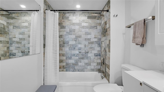 full bathroom with shower / bath combo with shower curtain, vanity, and toilet