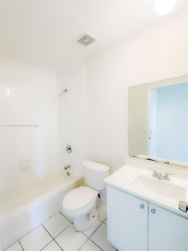 full bathroom featuring tile patterned flooring, vanity, toilet, and shower / washtub combination