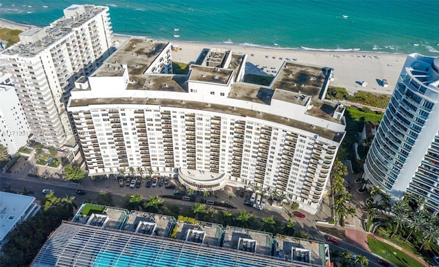 aerial view with a view of the beach and a water view