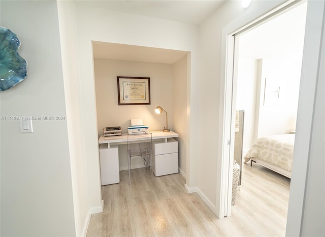 hallway featuring light hardwood / wood-style flooring