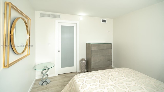 bedroom featuring light hardwood / wood-style floors