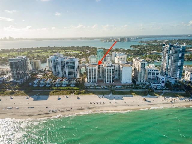 aerial view featuring a beach view and a water view