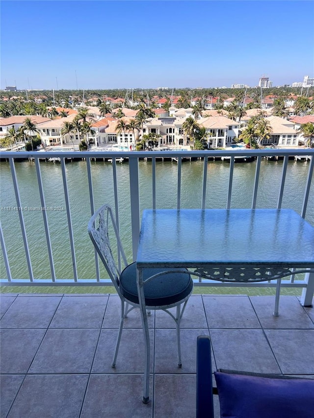 balcony featuring a water view